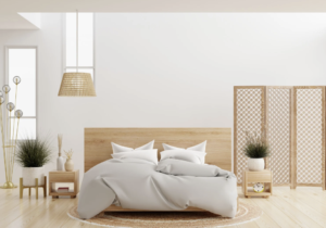 This image shows a modern, minimalist bedroom with a natural, Scandinavian-inspired design aesthetic
